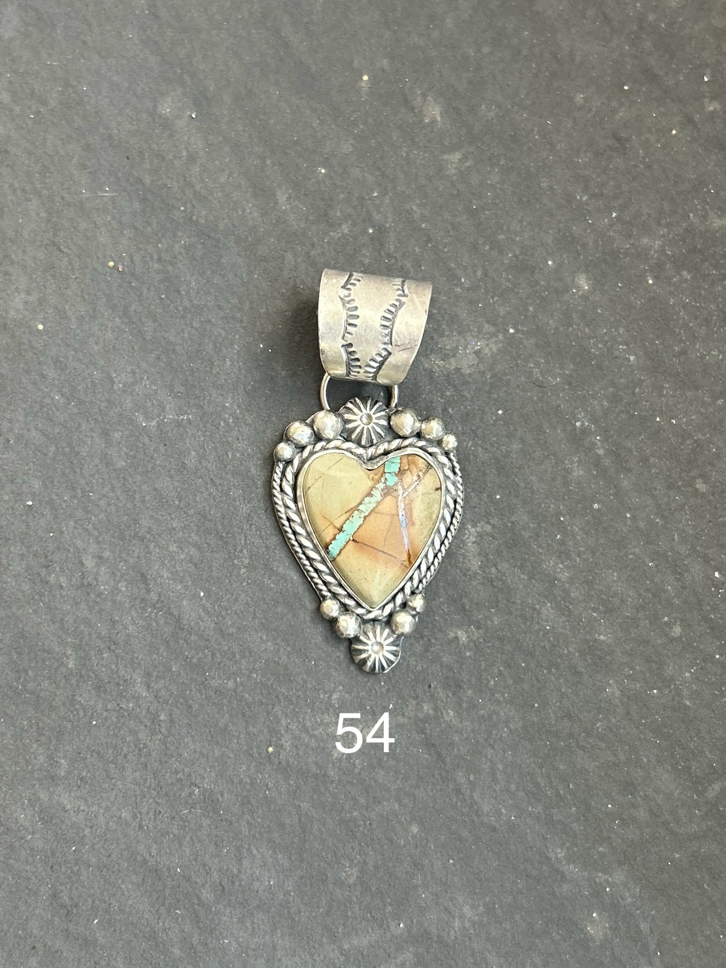 Sterling silver heart pendant with Ribbon Royston turquoise, handcrafted by artist Shay Pfeiffer in the USA