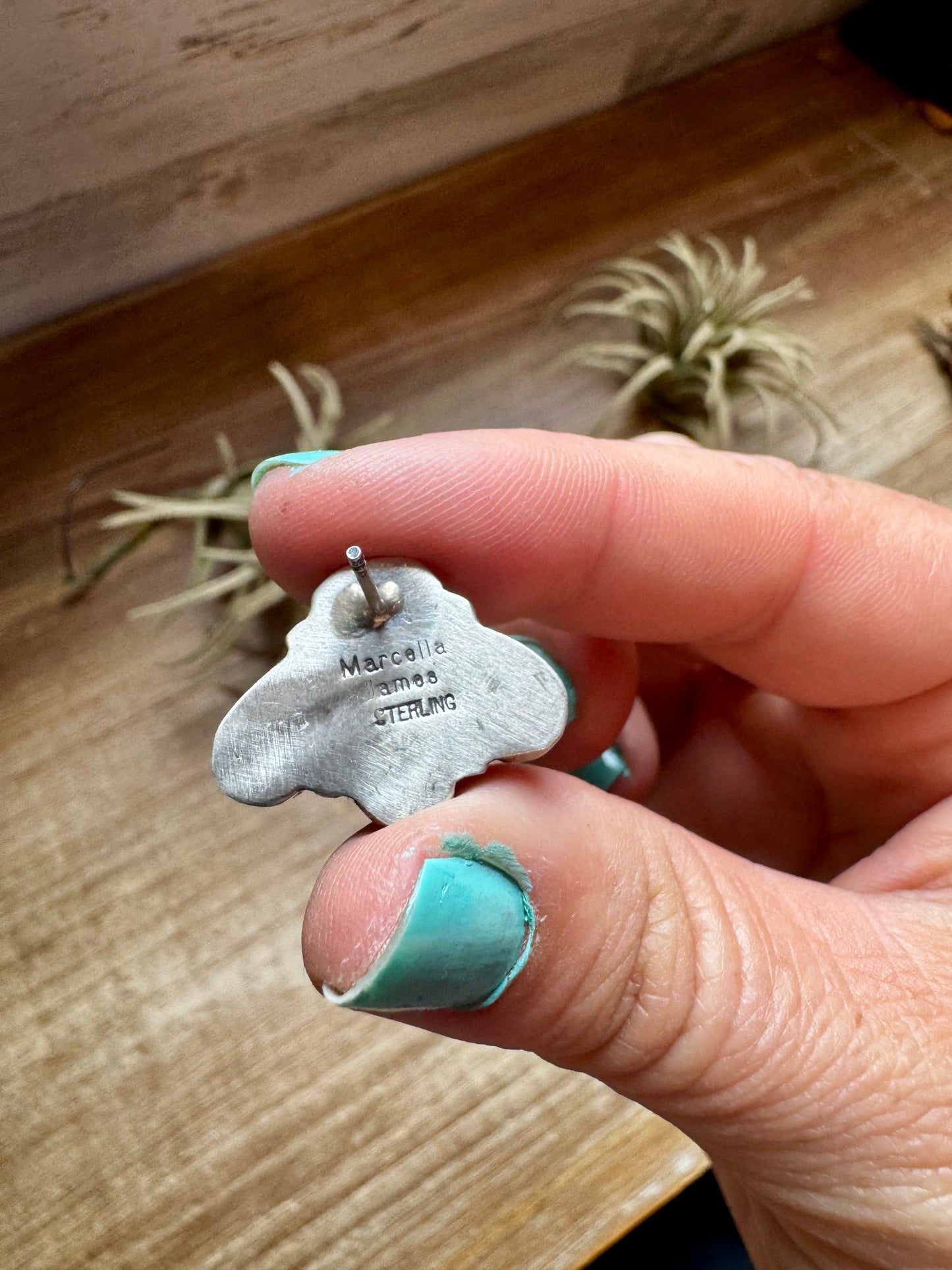 Handcrafted sterling silver stud earrings featuring vibrant spiny oyster shell, stamped by artist Marcella James. Made in the USA. One-of-a-kind design. Curated by The Bijoux FAB.
