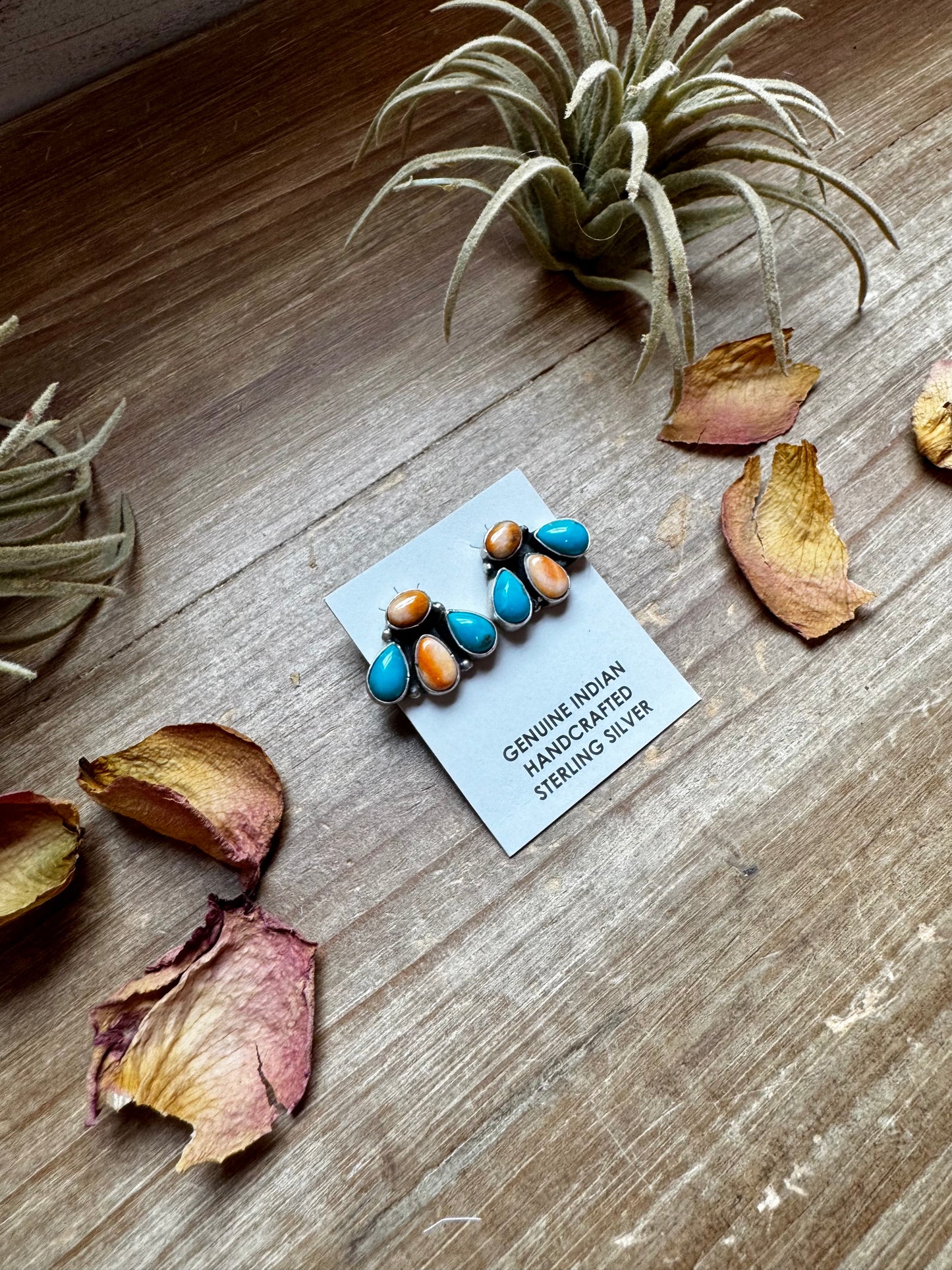 Handcrafted sterling silver stud earrings featuring orange spiny oyster and genuine turquoise stones. Stamped by Marcella James. Made in the USA. One-of-a-kind and naturally unique. Curated by The Bijoux FAB.