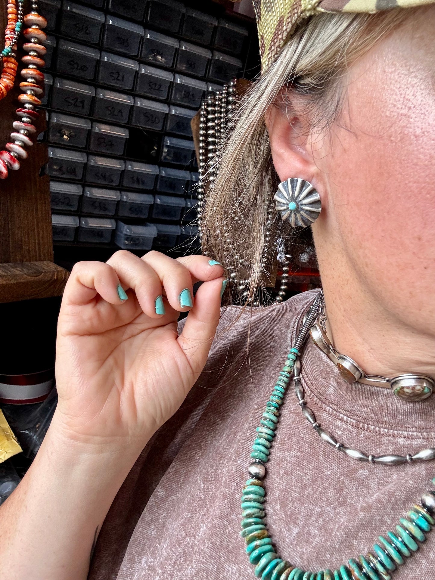 Handcrafted sterling silver concho earrings featuring genuine Kingman turquoise and traditional western stamping. Made in the USA. Each pair is one-of-a-kind. Curated by The Bijoux FAB.