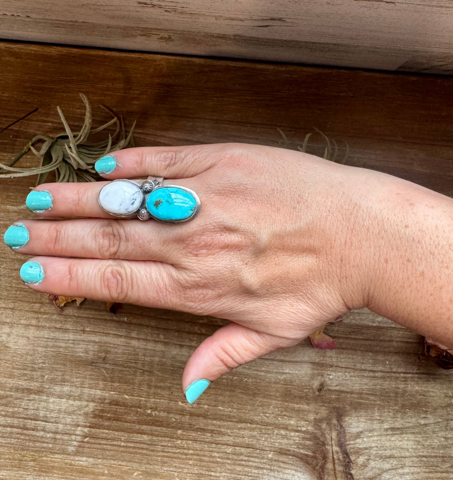 Handcrafted 2-stone ring featuring genuine turquoise and white buffalo set in solid sterling silver. Stamped BJA with an adjustable band. Made in the USA. Each piece is naturally unique. Curated by The Bijoux FAB.