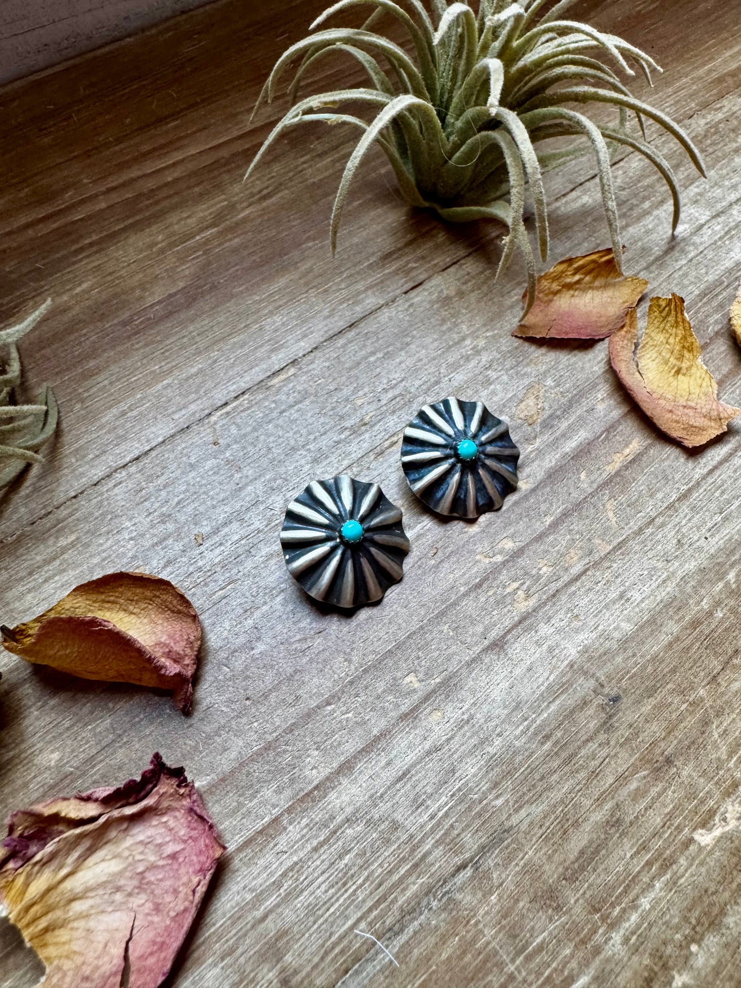 Handcrafted sterling silver concho earrings featuring genuine Kingman turquoise and traditional western stamping. Made in the USA. Each pair is one-of-a-kind. Curated by The Bijoux FAB.