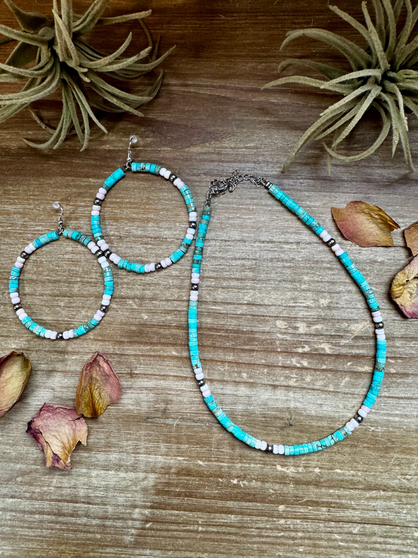 Handmade 14-inch choker with 3-inch extender, featuring 4mm turquoise variscite, pink conch, and sterling silver beads. Finished with silver-plated findings. Made in North Texas and exclusive to The Bijoux FAB. Matching earrings available.