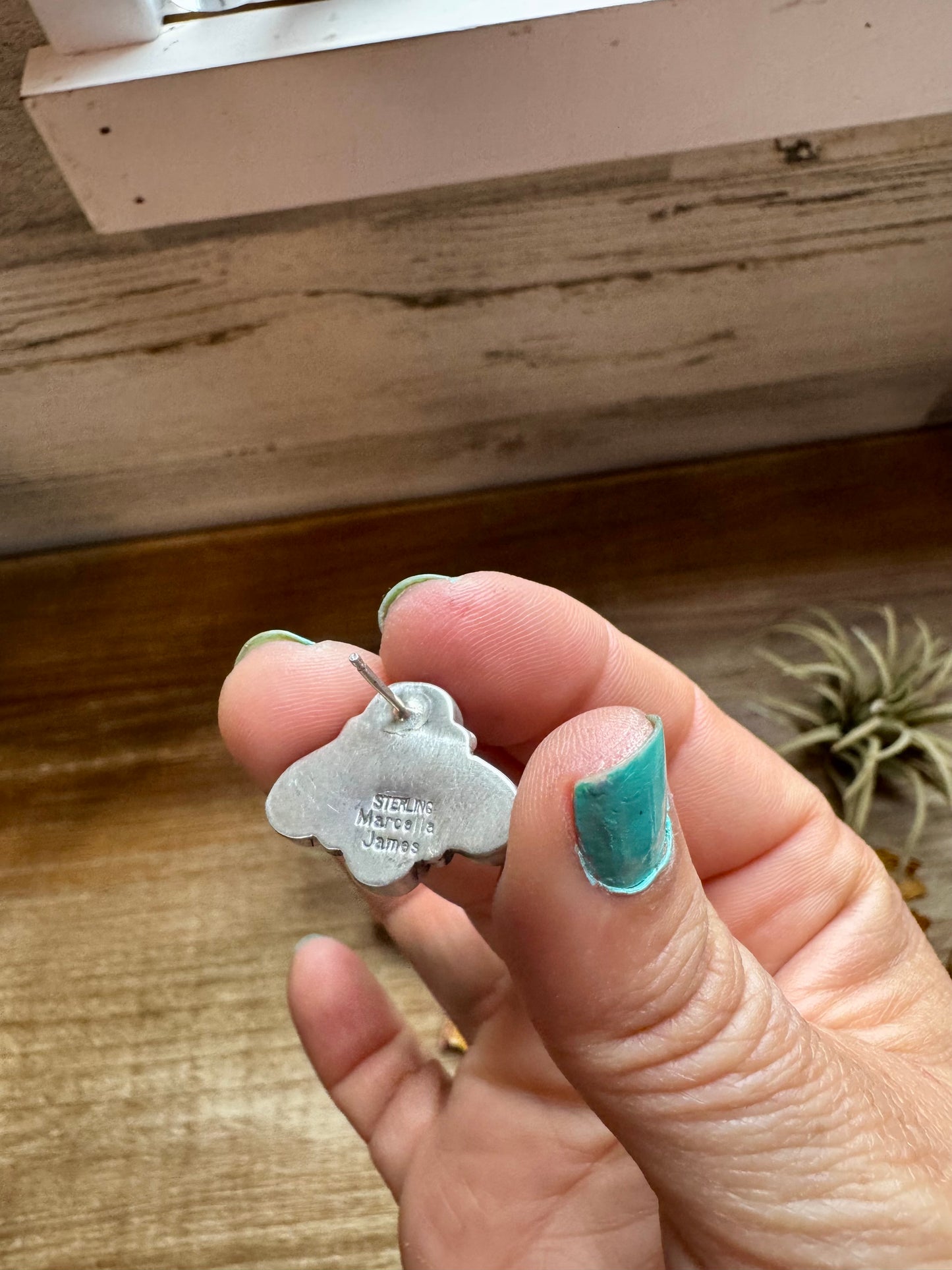 Handcrafted sterling silver stud earrings featuring genuine Kingman turquoise and pink conch stones. Stamped by artist Marcella James. Made in the USA. Each pair is naturally unique. Curated by The Bijoux FAB.