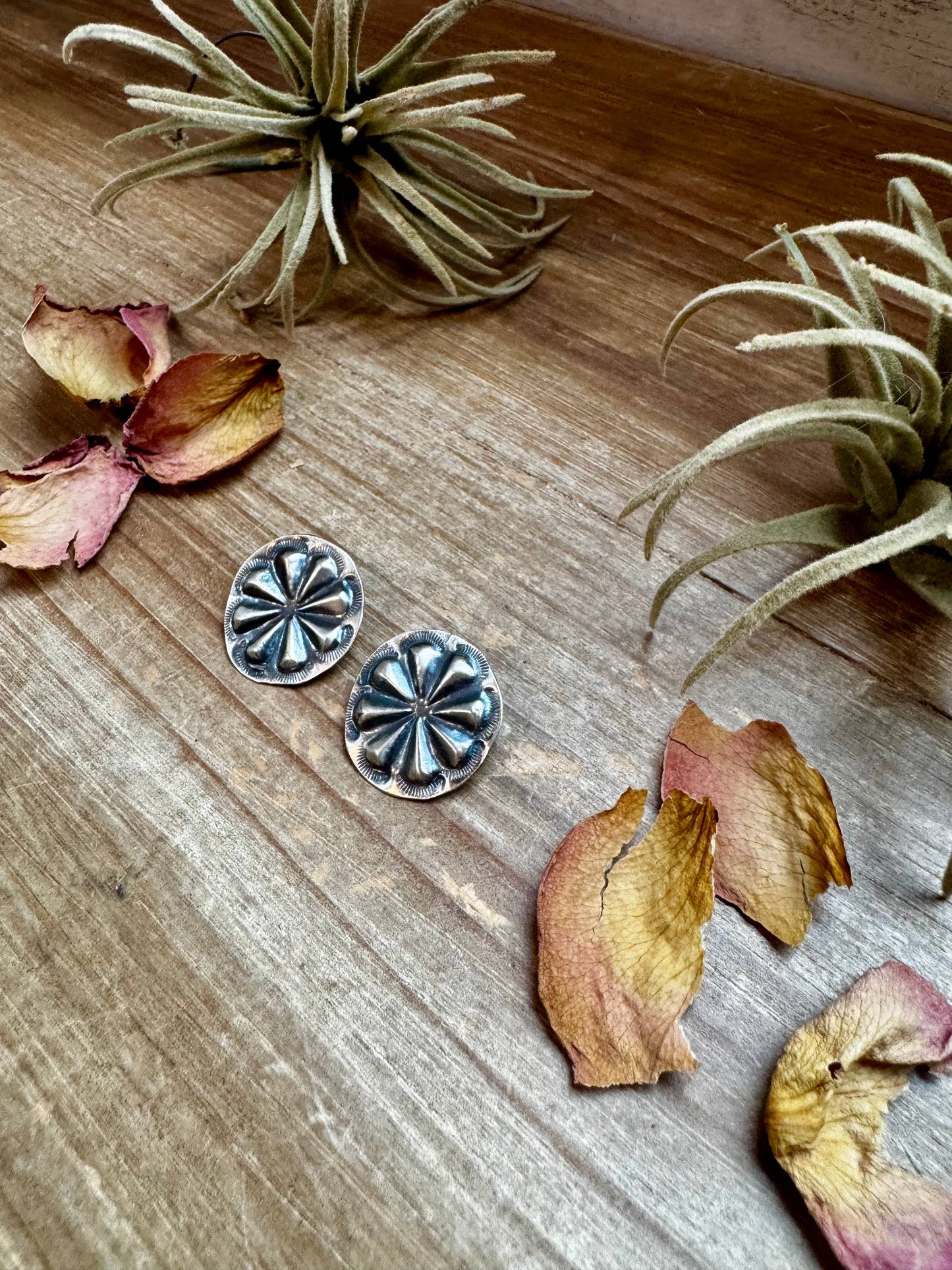 Handcrafted sterling silver concho stud earrings with traditional western stamping and stud backing. Stamped STERLING and made in the USA. Lightweight and easy to wear. Curated by The Bijoux FAB.