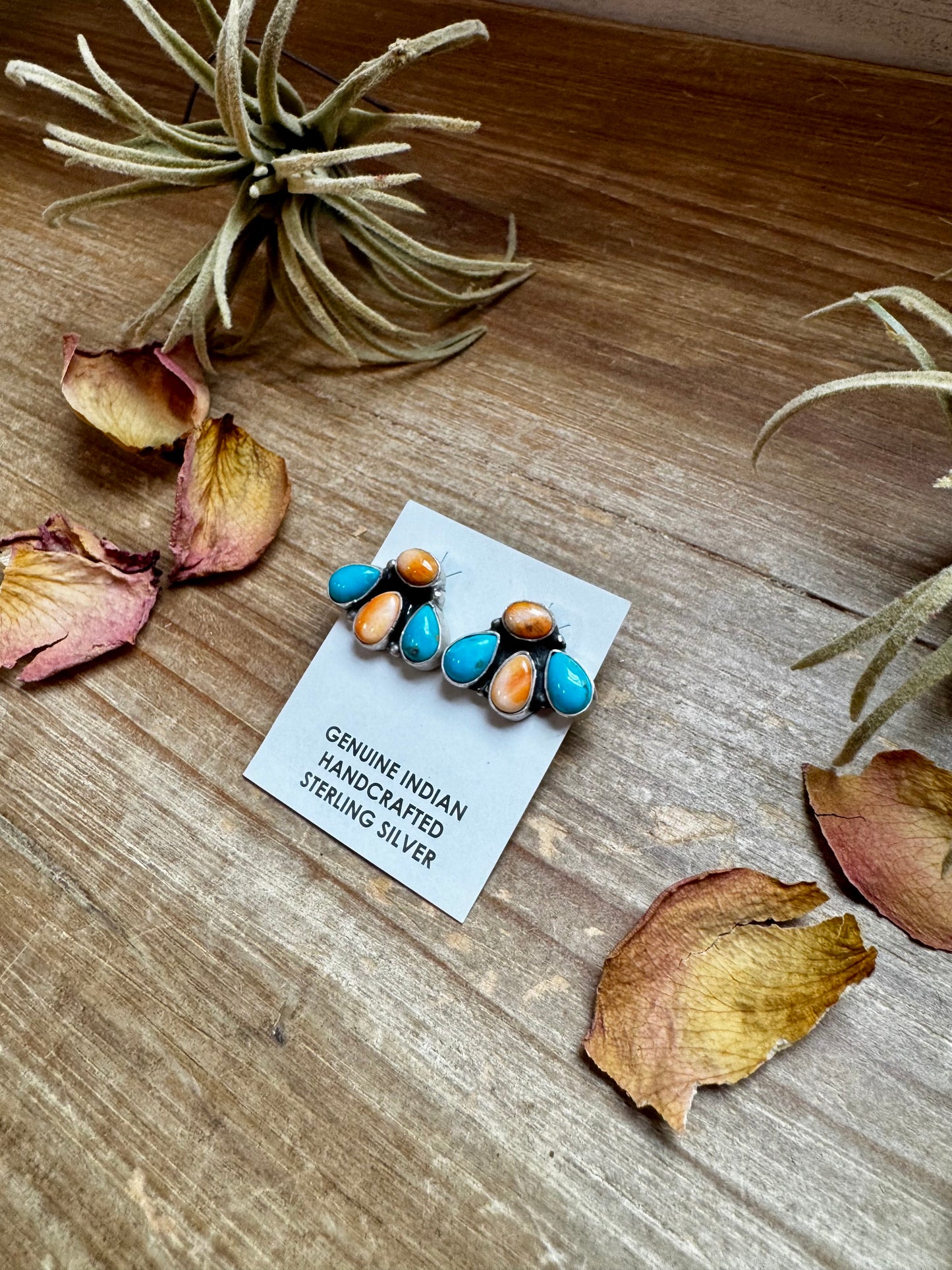 Handcrafted sterling silver stud earrings featuring orange spiny oyster and genuine turquoise stones. Stamped by Marcella James. Made in the USA. One-of-a-kind and naturally unique. Curated by The Bijoux FAB.