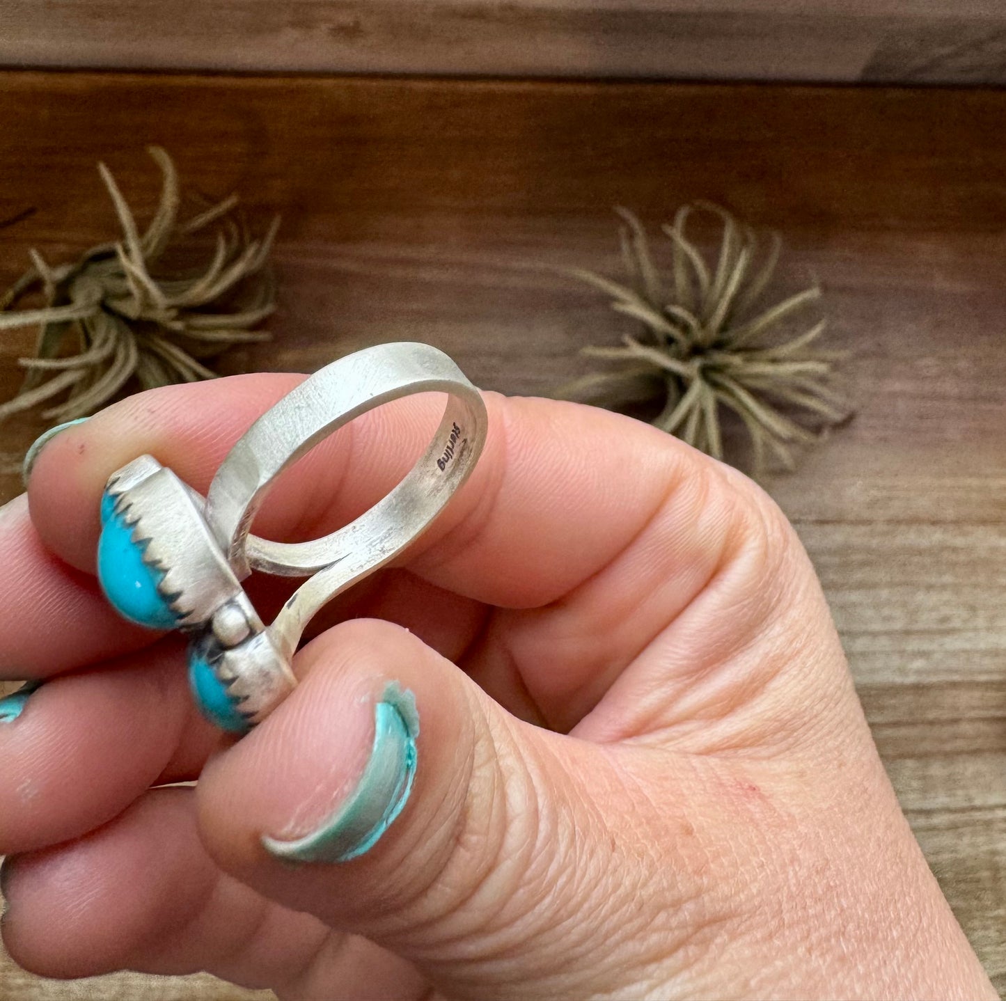 Adjustable sterling silver ring featuring three genuine Kingman turquoise stones in a bold southwestern design. Handmade in the USA. Each ring is naturally unique. Curated by The Bijoux FAB.