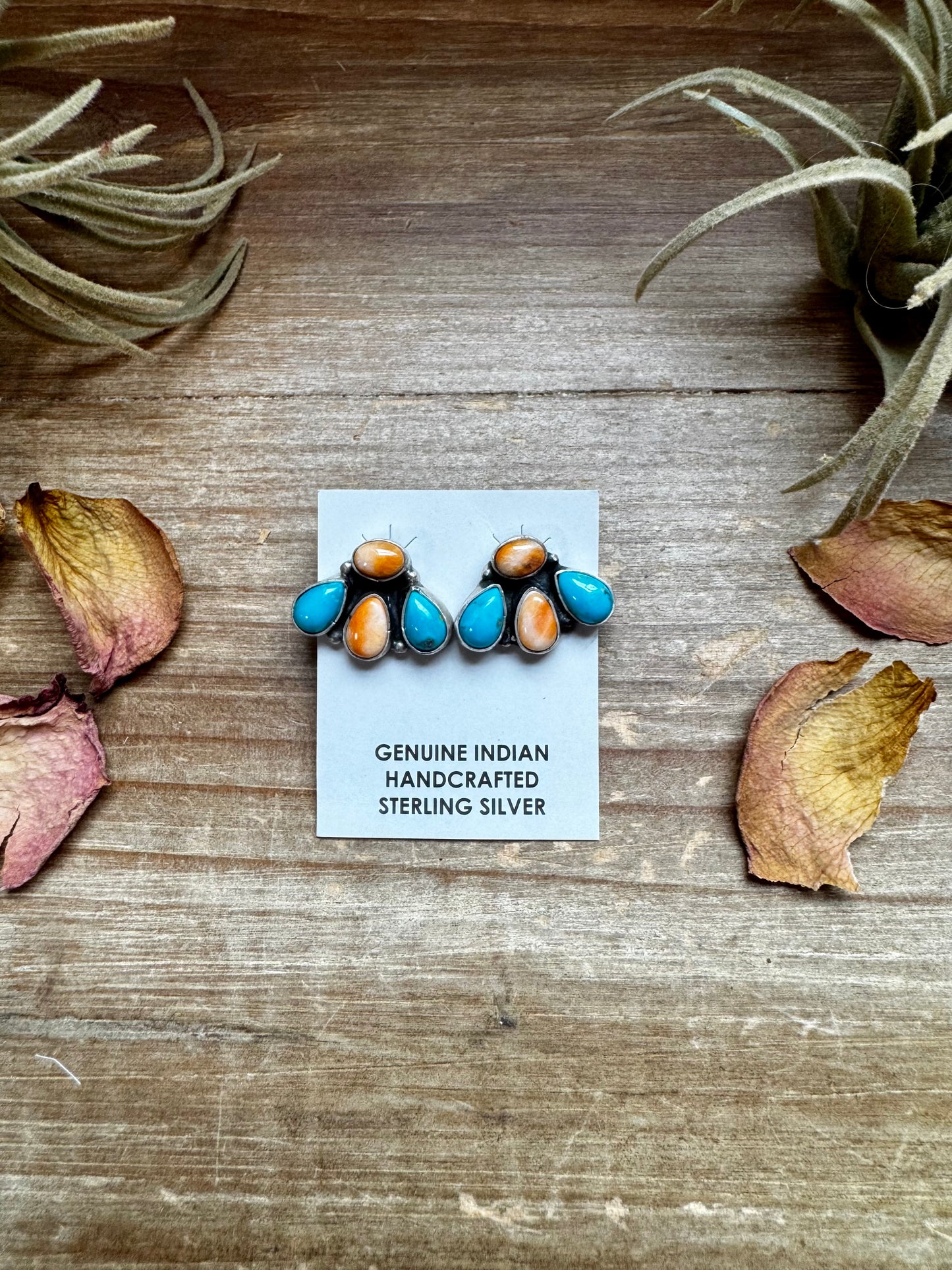 Handcrafted sterling silver stud earrings featuring orange spiny oyster and genuine turquoise stones. Stamped by Marcella James. Made in the USA. One-of-a-kind and naturally unique. Curated by The Bijoux FAB.