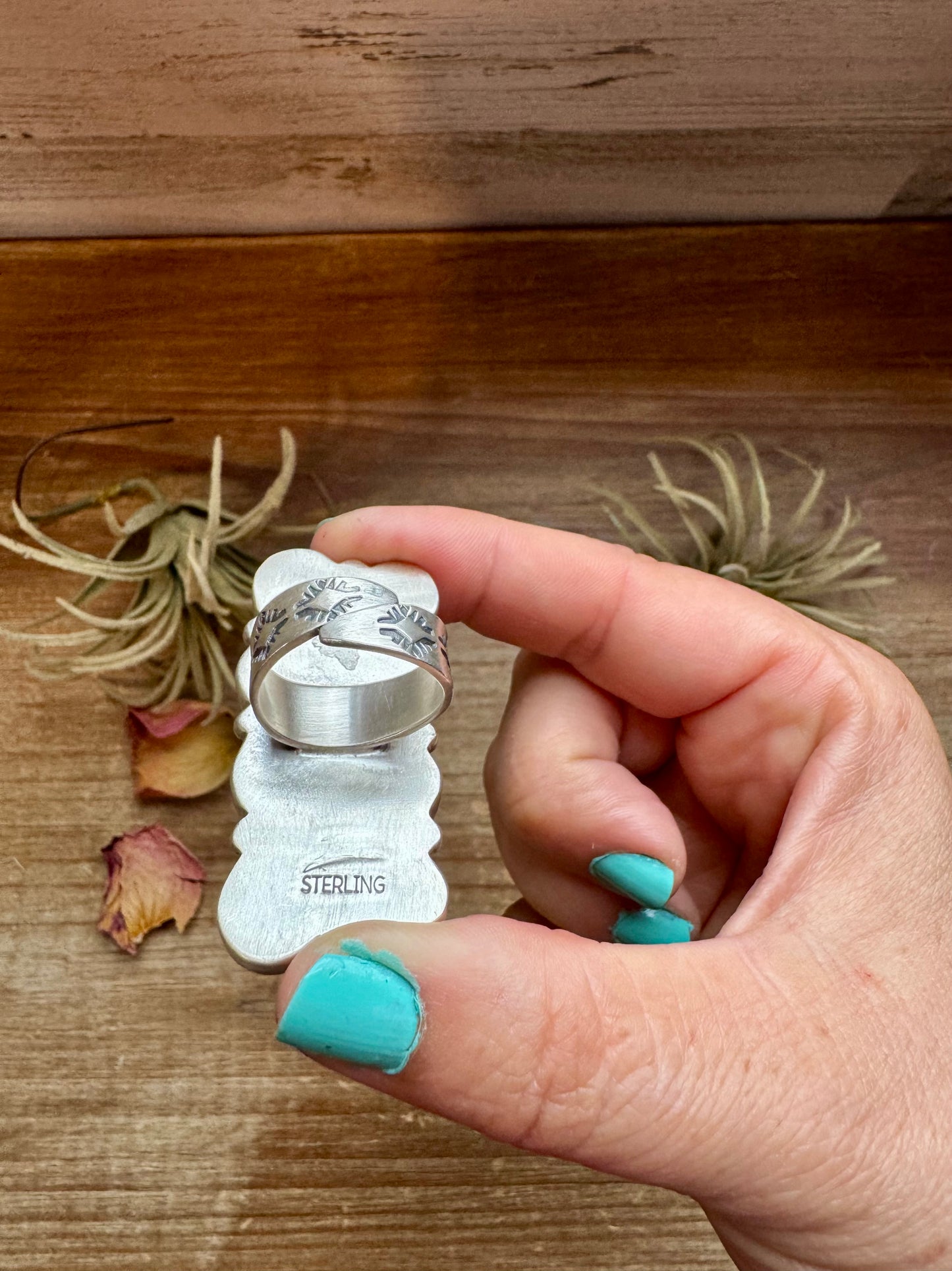Adjustable long statement ring featuring eight genuine White Buffalo turquoise stones set in solid sterling silver with a detailed band. Stamped ZIA. Handmade in the USA. One-of-a-kind and curated by The Bijoux FAB.