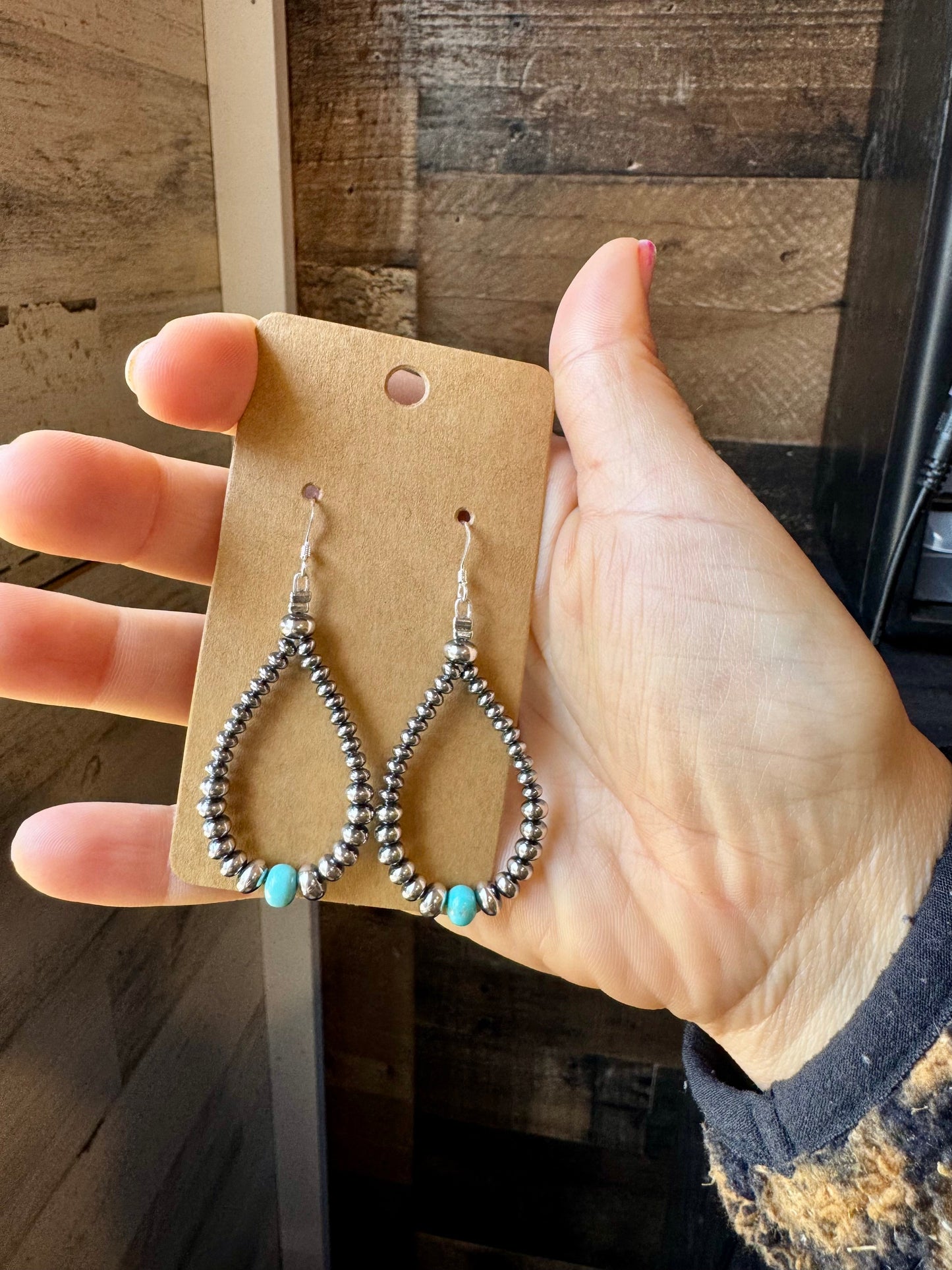 2.5-inch handmade earrings featuring 4mm, 5mm, and 6mm saucer sterling silver pearls with 6mm Mexican turquoise stones. Finished with .925 sterling silver hooks. Each turquoise stone is naturally unique. Lightweight and handcrafted in the USA by The Bijoux FAB.