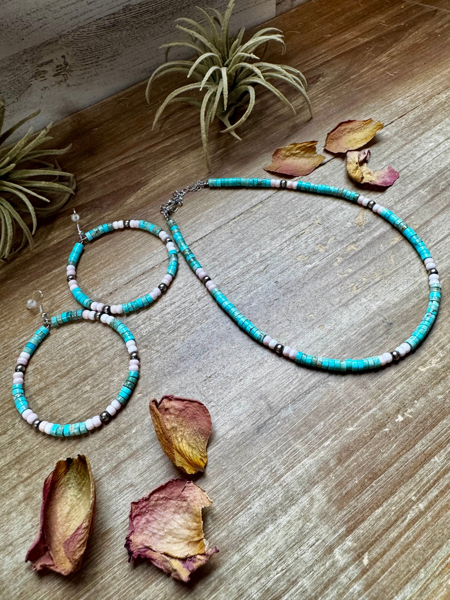 Handmade 14-inch choker with 3-inch extender, featuring 4mm turquoise variscite, pink conch, and sterling silver beads. Finished with silver-plated findings. Made in North Texas and exclusive to The Bijoux FAB. Matching earrings available.