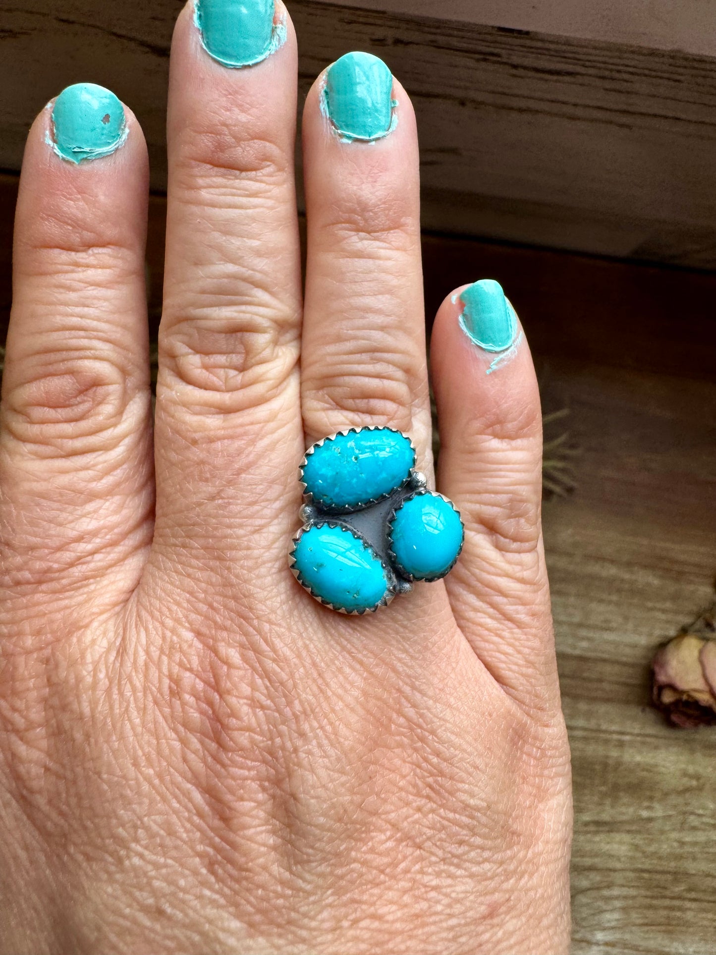 Adjustable sterling silver ring featuring three genuine Kingman turquoise stones in a bold southwestern design. Handmade in the USA. Each ring is naturally unique. Curated by The Bijoux FAB.