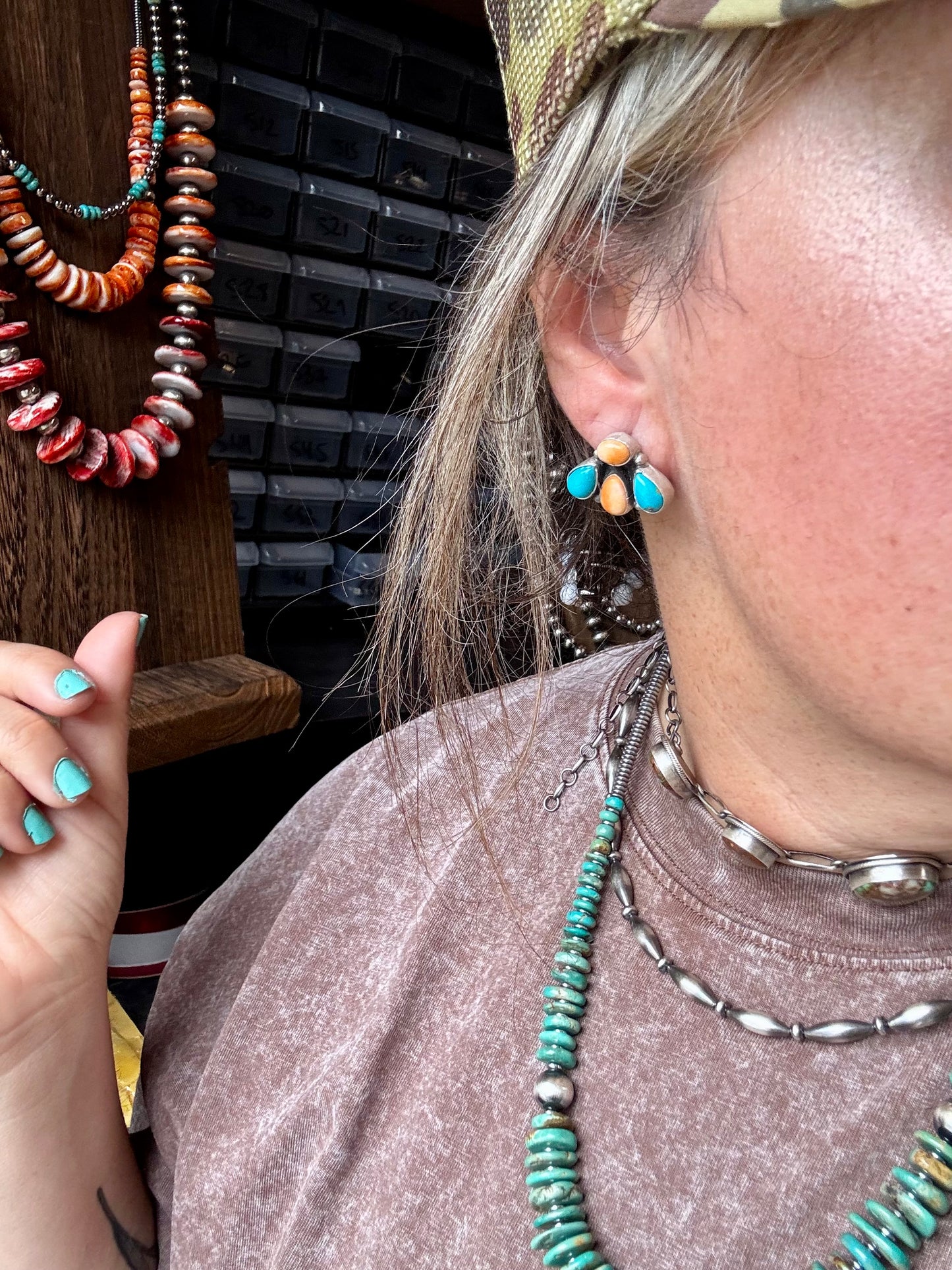 Handcrafted sterling silver stud earrings featuring orange spiny oyster and genuine turquoise stones. Stamped by Marcella James. Made in the USA. One-of-a-kind and naturally unique. Curated by The Bijoux FAB.
