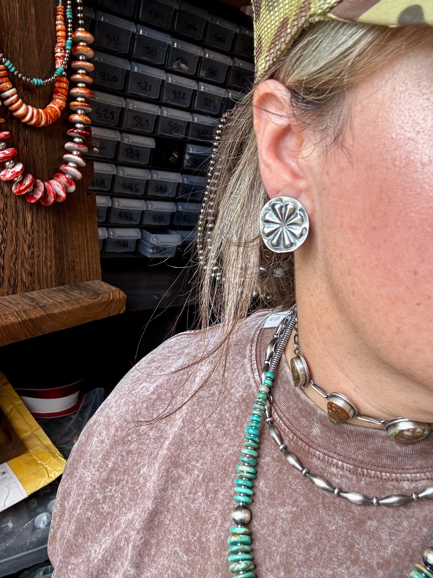 Handcrafted sterling silver concho stud earrings with traditional western stamping and stud backing. Stamped STERLING and made in the USA. Lightweight and easy to wear. Curated by The Bijoux FAB.