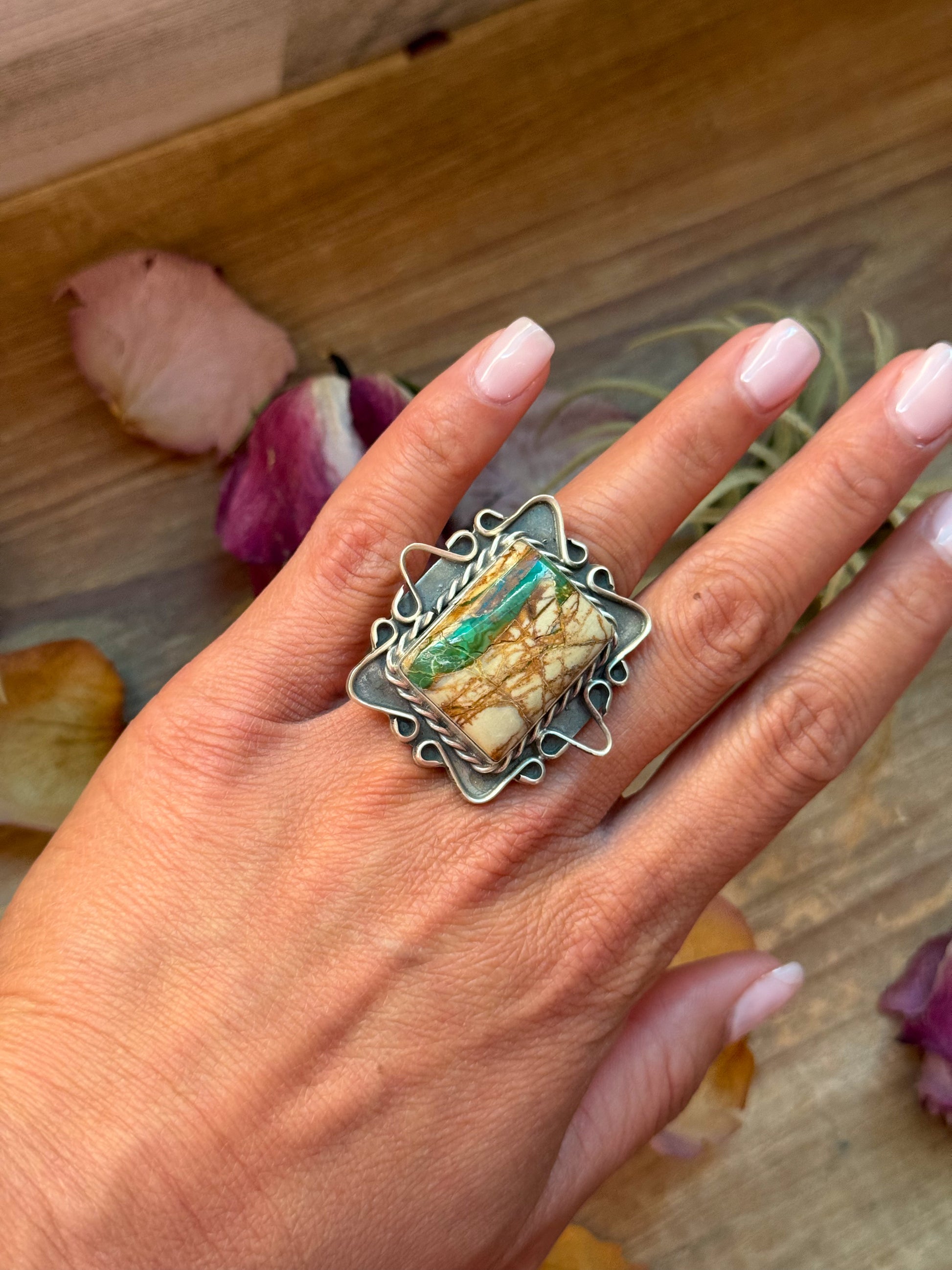 Size 6.5 sterling-silver ring with Ribbon Turquoise, wide band, stamped PN Philbert Nez and Sterling, handmade in the USA