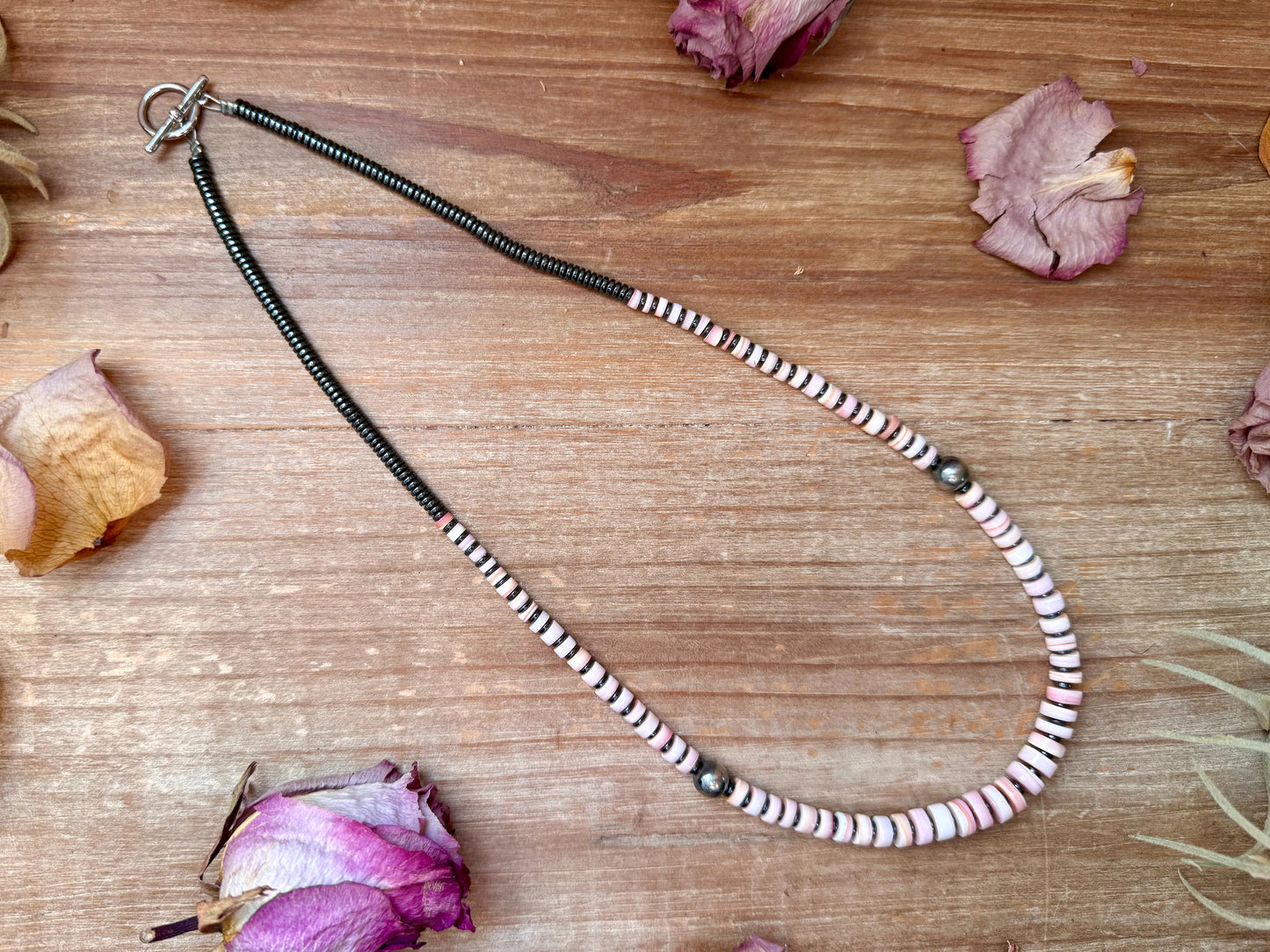 20.5-inch pink conch graduated heishi necklace with hematite spacers and sterling silver pearls, handmade by The Bijoux FAB in the USA