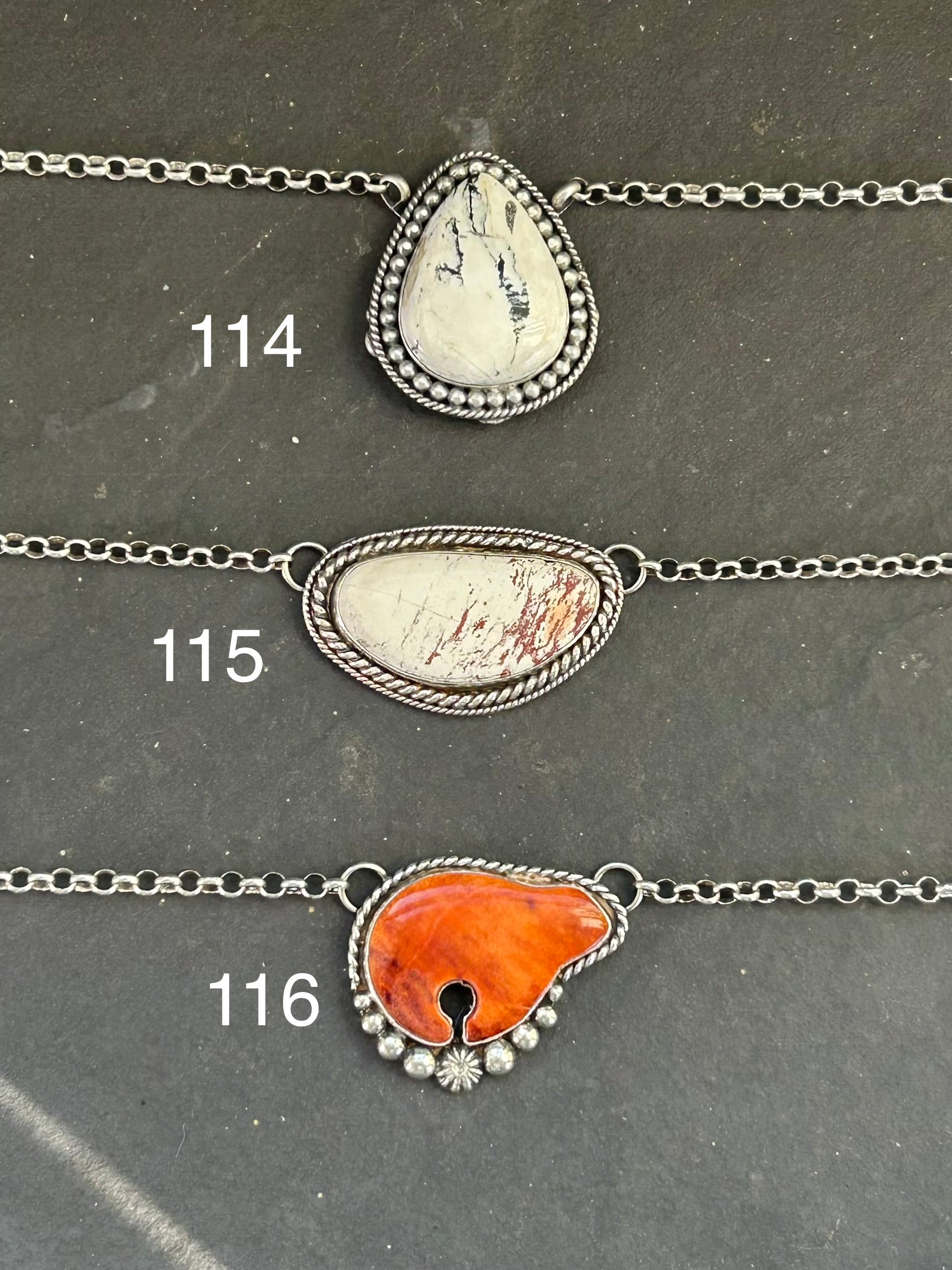 Sterling silver fixed chain necklace with orange spiny oyster bear by Texas artist Jason Ogg
