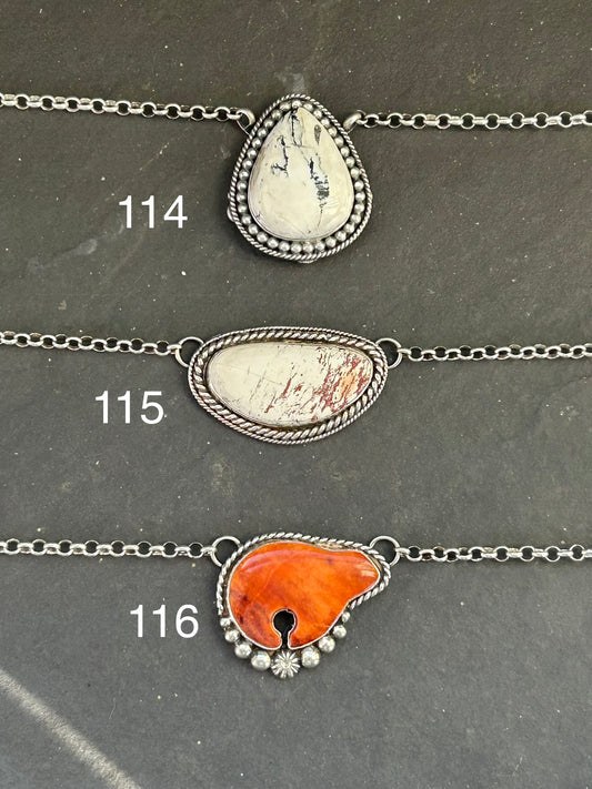 Sterling silver fixed chain necklace with orange spiny oyster bear by Texas artist Jason Ogg
