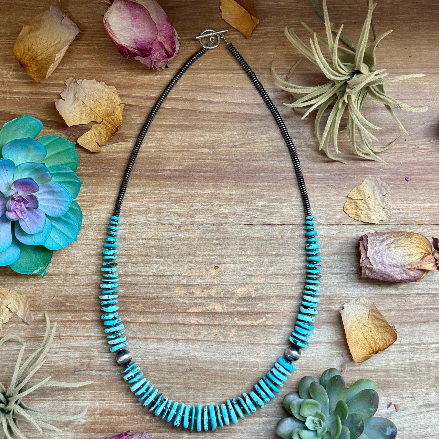 23 inch ice blue turquoise graduated necklace with hematite and sterling silver pearls handmade in the USA by The Bijoux FAB