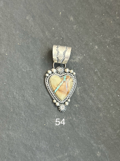 Sterling silver heart pendant with Ribbon Royston turquoise, handcrafted by artist Shay Pfeiffer in the USA