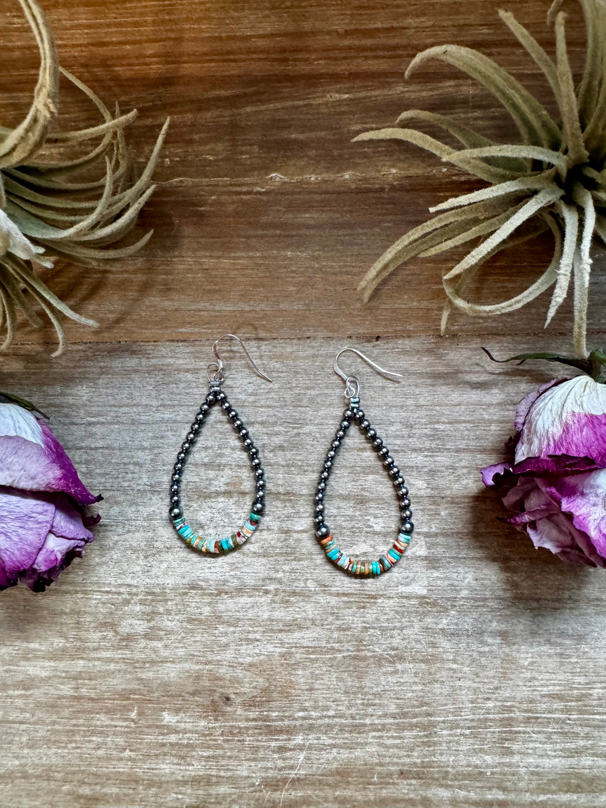 Sterling silver pearl earrings with green and orange heishi beads, handmade by The Bijoux FAB in the USA