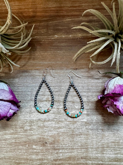 Sterling silver pearl earrings with green and orange heishi beads, handmade by The Bijoux FAB in the USA
