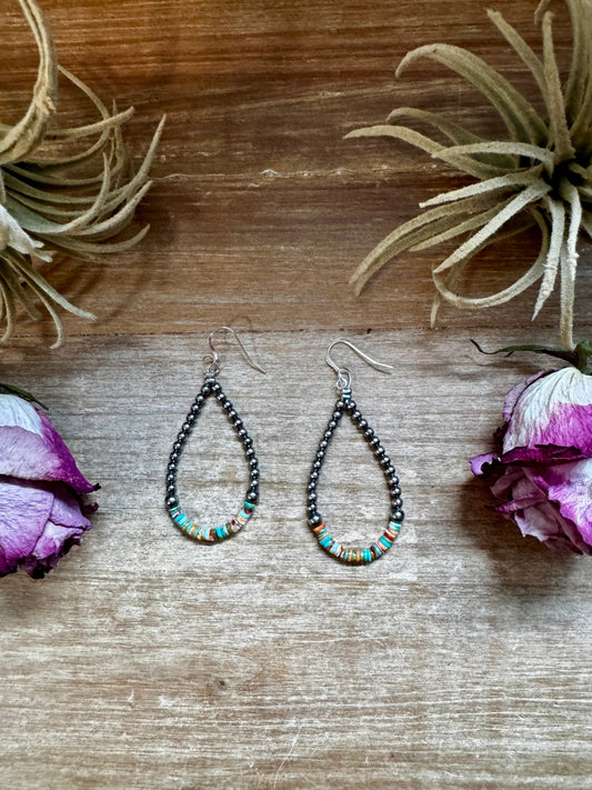 Sterling silver pearl earrings with green and orange heishi beads, handmade by The Bijoux FAB in the USA