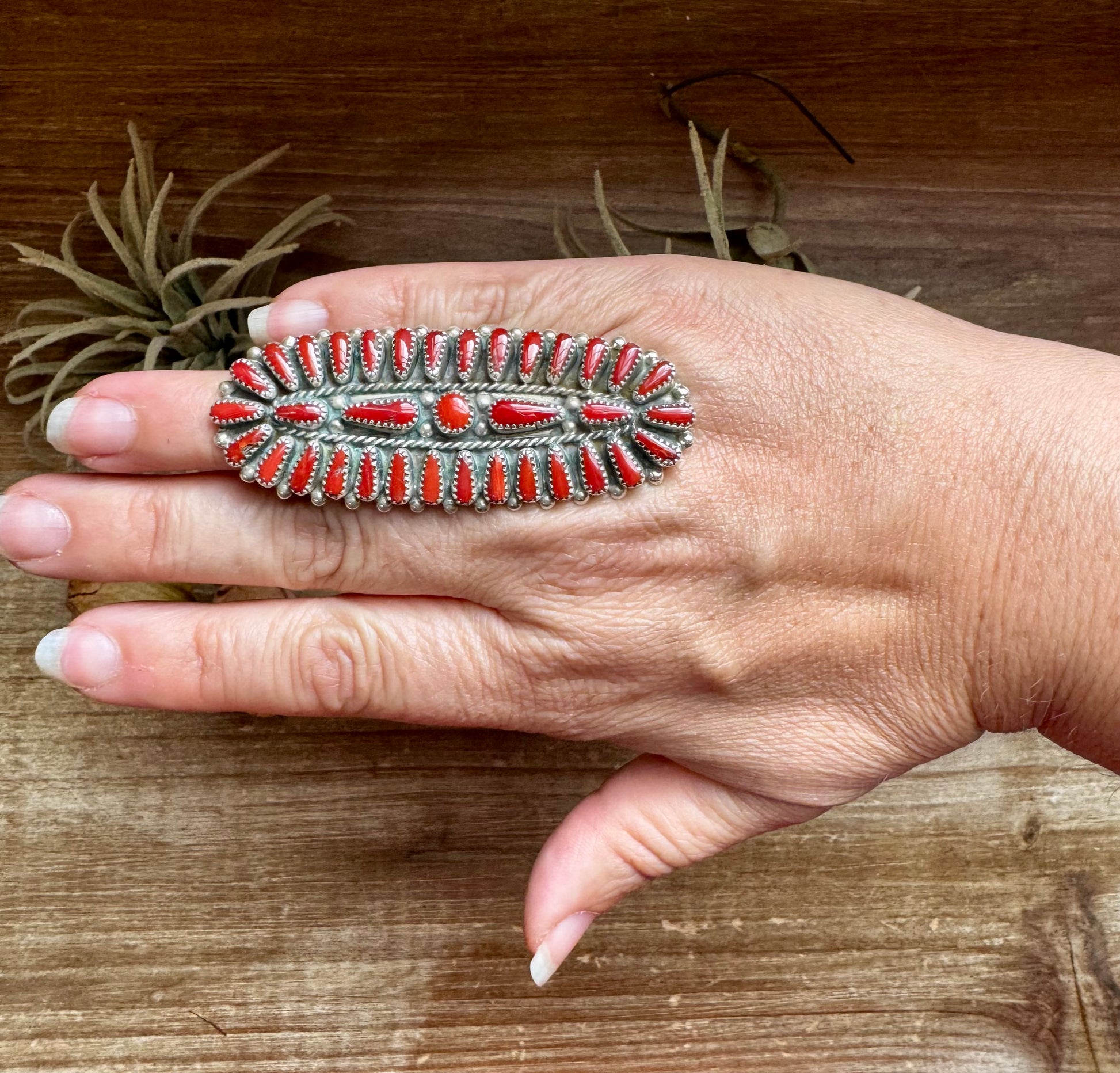 Adjustable coral and sterling silver Navajo ring by Donovan Wilson, stamped DMW