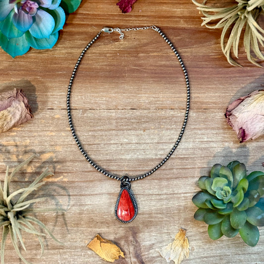 Red spiny oyster teardrop sterling silver charm with free sterling silver pearl necklace handmade by The Bijoux FAB
