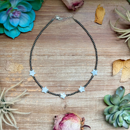 Handmade 15-inch necklace featuring a freshwater pearl star centerpiece, 3mm sterling silver pearls, 4mm sterling silver pearl accents, sterling silver findings, and an extender. Made in the USA by The Bijoux FAB.
