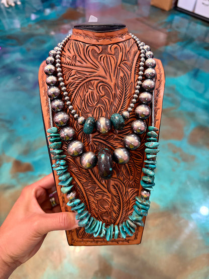 Heather Welper's warehouse pick stack featuring three handcrafted turquoise necklaces layered together with sterling silver pearls, graduated turquoise beads, hematite accents, and natural blue turquoise stones, handmade by The Bijoux FAB in the USA.