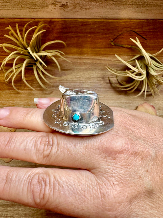 Sterling silver adjustable cowboy hat ring with Kingman turquoise, handmade by Navajo silversmith Robby Manuelito in the USA