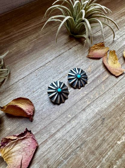 Handcrafted sterling silver concho earrings featuring genuine Kingman turquoise and traditional western stamping. Made in the USA. Each pair is one-of-a-kind. Curated by The Bijoux FAB.