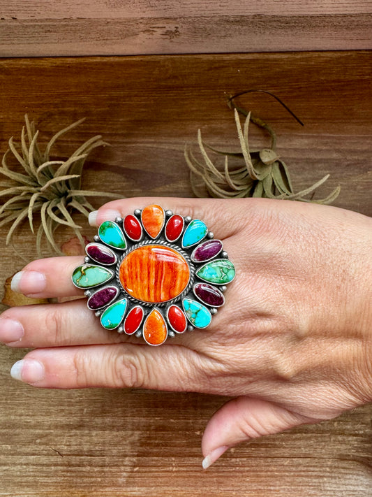 Adjustable Native made sterling silver cluster ring by E. Richards with orange spiny oyster center and Sonoran Gold turquoise accents