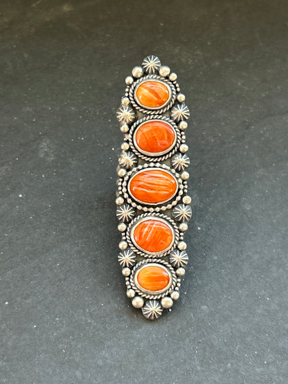 Sterling silver orange spiny oyster crawler ring, handcrafted by artist Shay Pfeiffer in the USA