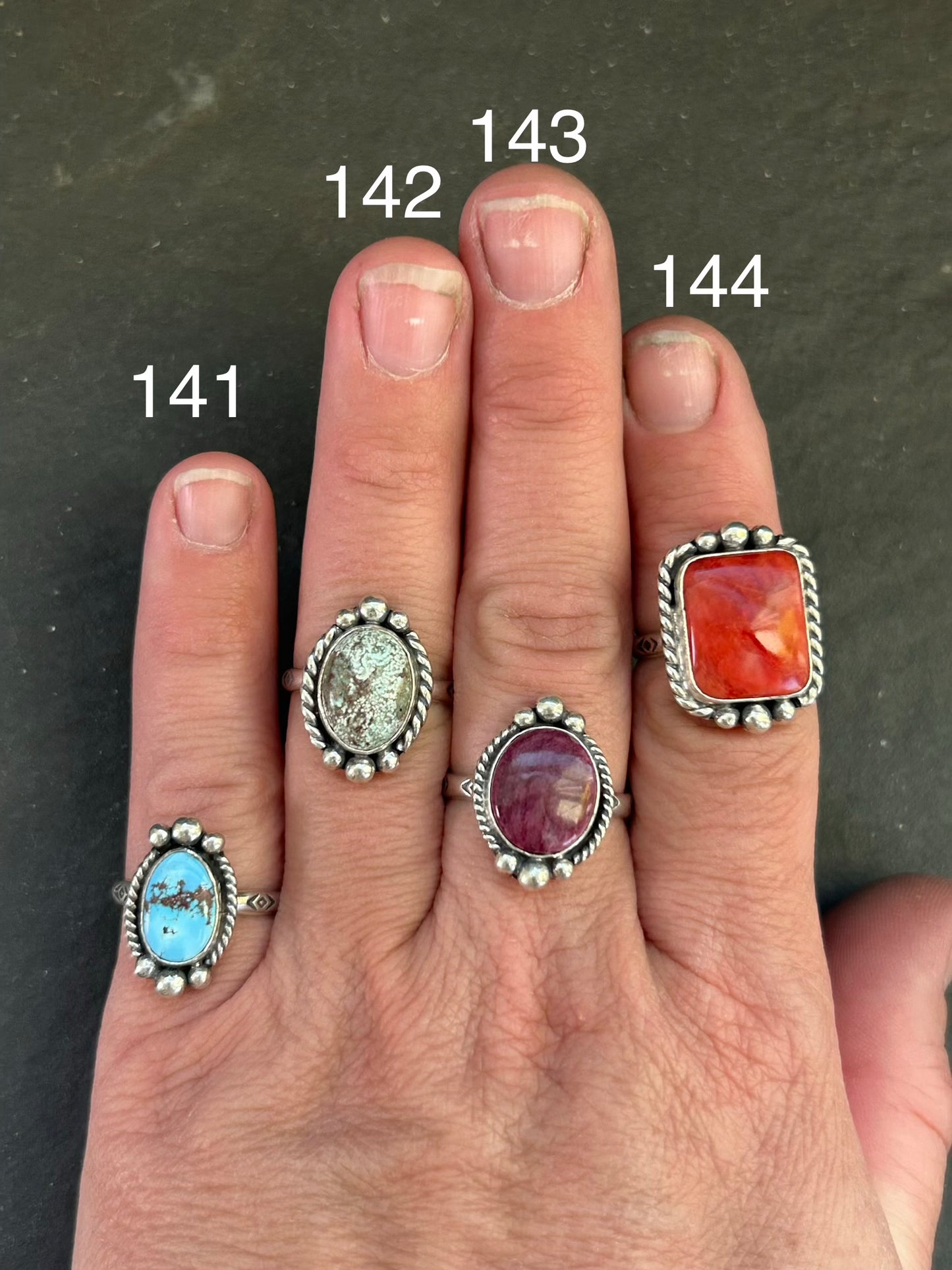 Sterling silver stamped stacking ring with red spiny oyster and Medicine Man eye pattern by Texas artist Jason Ogg