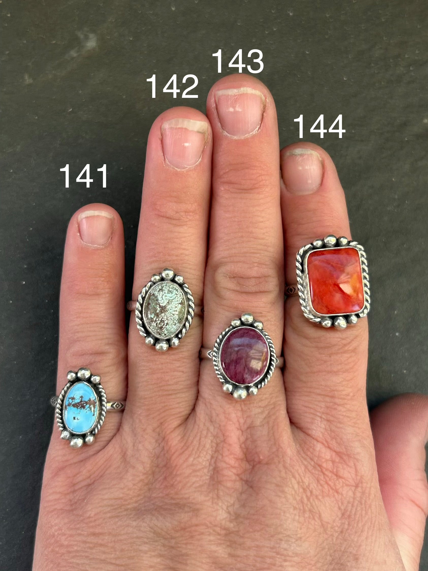 Sterling silver stamped stacking ring with red spiny oyster and Medicine Man eye pattern by Texas artist Jason Ogg