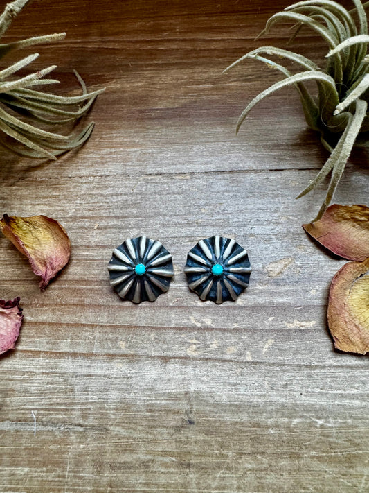 Handcrafted sterling silver concho earrings featuring genuine Kingman turquoise and traditional western stamping. Made in the USA. Each pair is one-of-a-kind. Curated by The Bijoux FAB.