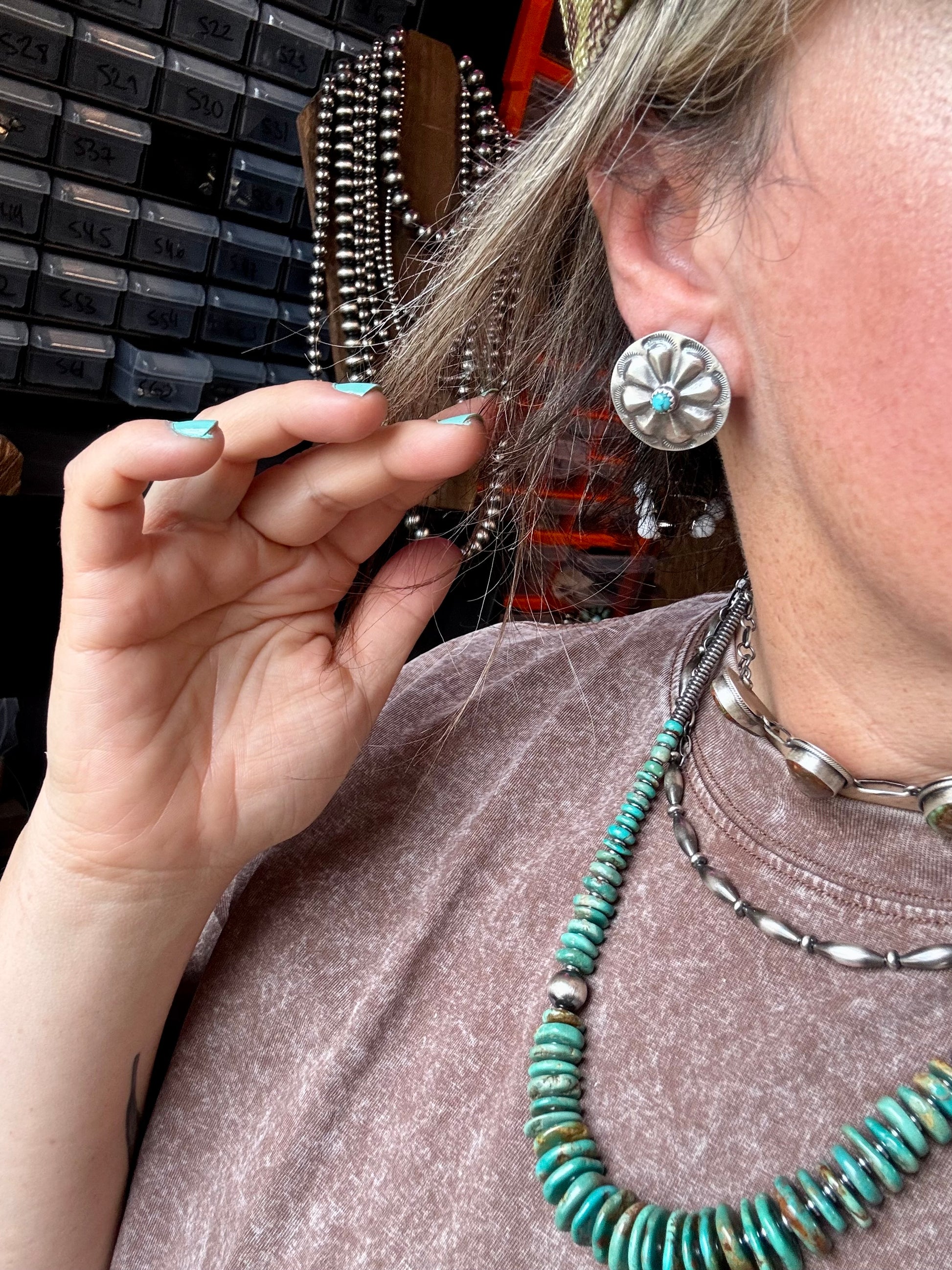 Classic stud earrings featuring genuine Kingman turquoise set in solid sterling silver with stamped backing. Handmade in the USA. Each stone is naturally unique. Curated by The Bijoux FAB.