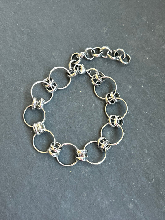 Sterling silver Medicine Man Eye pattern charm chain bracelet with 2-inch extender, handcrafted by artist Jason Ogg in the USA
