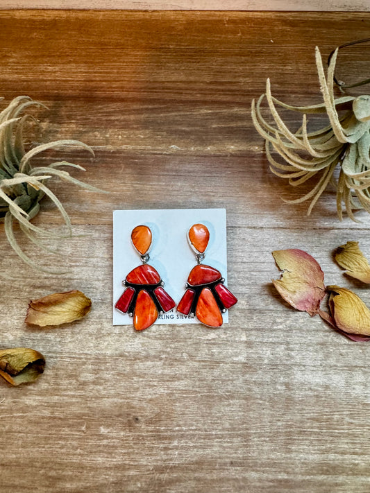 Dangle earrings with orange and spiny oyster cluster stones and stud post, handmade by Navajo artist Marcella James in sterling silver

