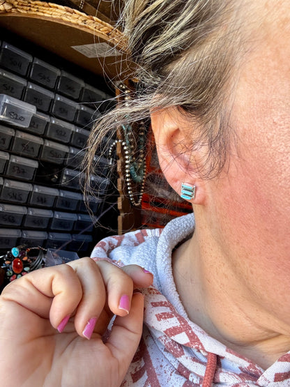 Zuni-made square Kingman turquoise stud earrings in sterling silver by artist Davis Kaamasee