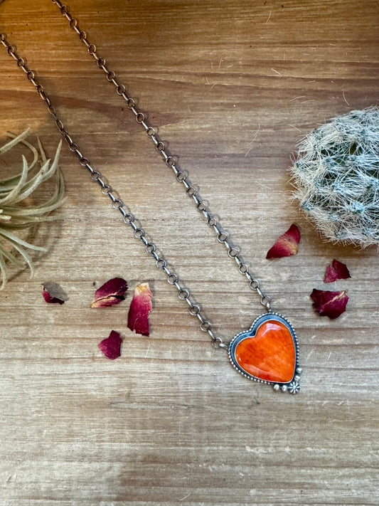 20 inch sterling silver necklace with orange spiny heart shape