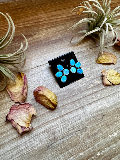 One-of-a-kind sterling silver half-cluster stud earrings with blue opal stones, handmade in the USA