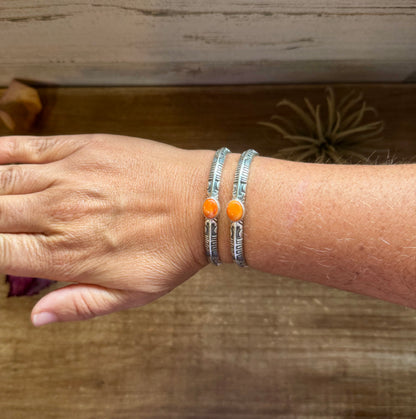 Sterling silver cuff bracelet with orange spiny oyster stone, stamped BS, Native made in the USA