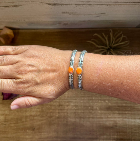 Sterling silver cuff bracelet with orange spiny oyster stone, stamped BS, Native made in the USA