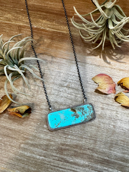 Sterling silver 20.5" necklace with large Kingman turquoise bar centerpiece, handmade and stamped by Native artist Larry Etcitty