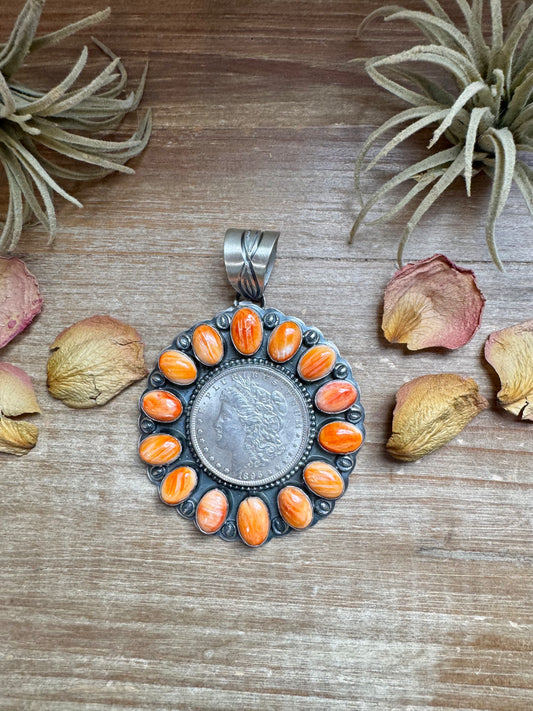 Orange spiny oyster and sterling silver coin pendant, handmade by Native artist Gabby, one of a kind