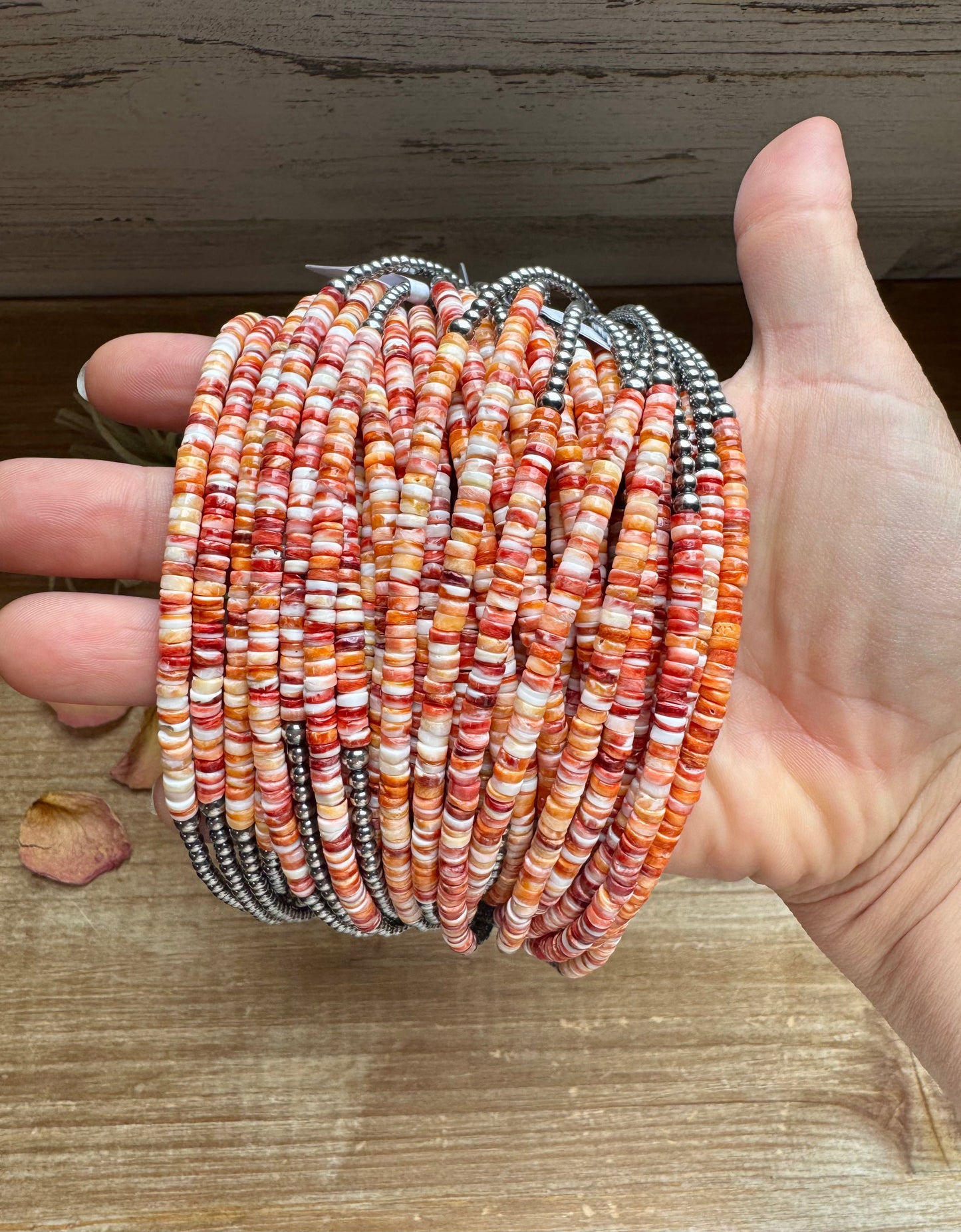 15-inch handmade necklace with orange spiny oyster heishi and sterling silver pearls, made in the USA