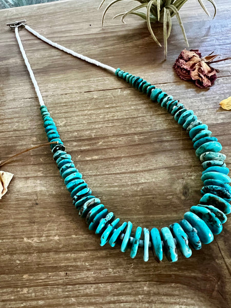 22 inch Graduated turquoise necklace and white shell